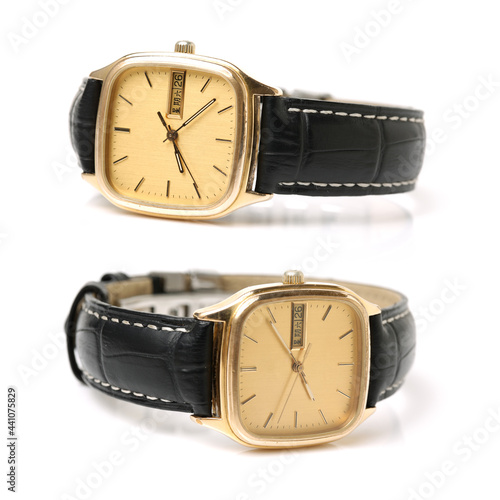 golden watch isolated on a white background