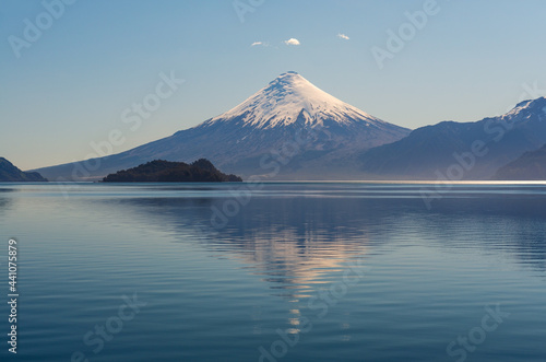 Osorno volcano snowcapped peak by All Saints Lake near Puerto Varas, Chilean lake district, Chile.