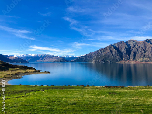 Beautiful landscape of mountain, lake and blue sky in Wanaka, south island, New Zealand.
