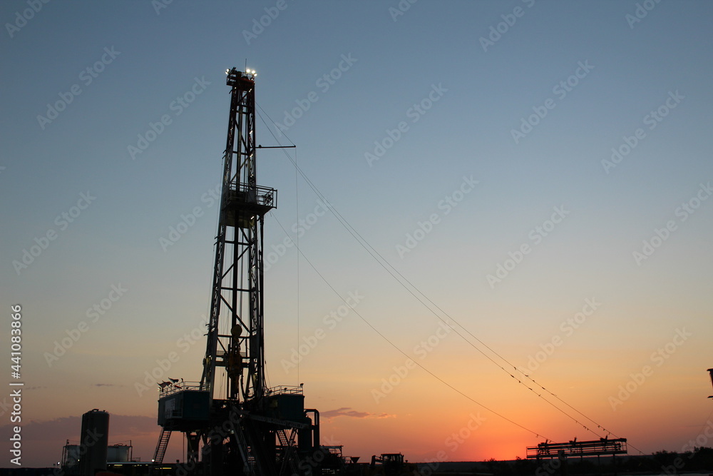 Gorgeous sunrise view of a drilling rig in the Permian Basin of West Texas