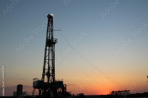 Gorgeous sunrise view of a drilling rig in the Permian Basin of West Texas