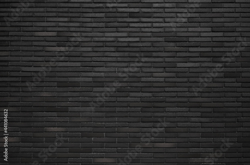 Dark retro brick wall texture background. Vintage brickwork pattern