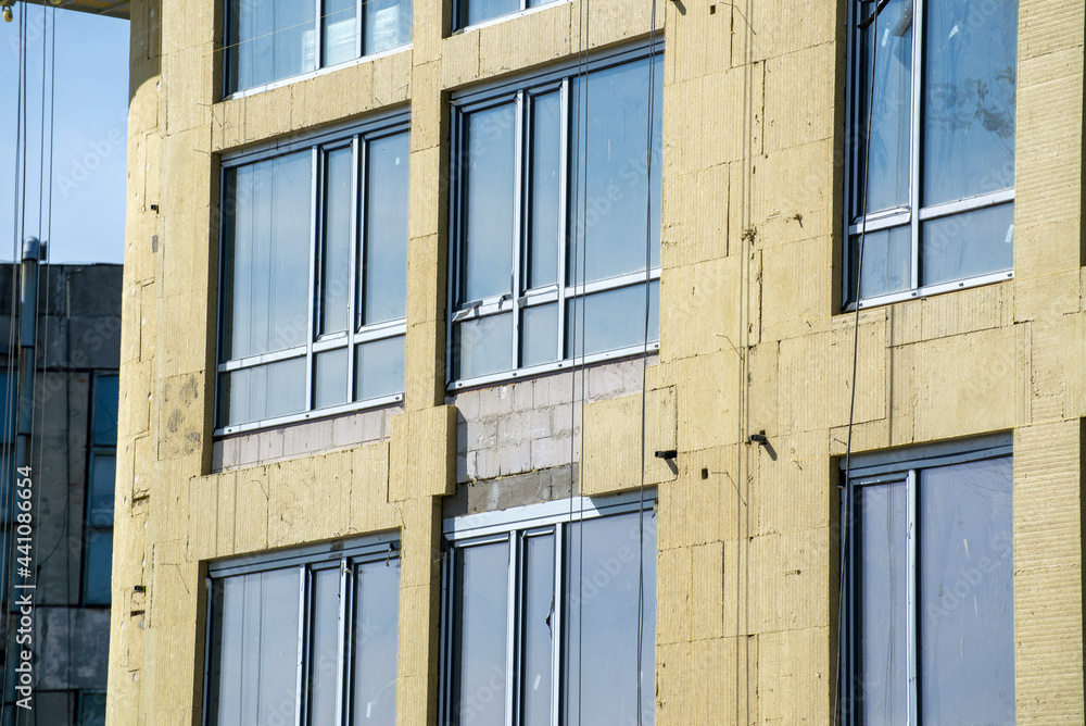 Building external wall thermal insulation with mineral wool. Exterior