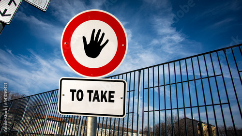 Street Sign to TO GIVE versus TO TAKE