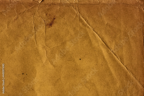紙テクスチャー背景(茶色) 折れ目の跡とシワがある紙