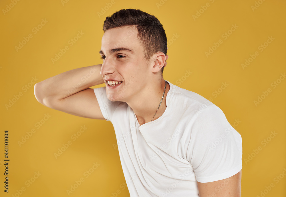 handsome man in white t-shirt looking aside emotions isolated background handsome man in white t-shirt looking aside emotions isolated background