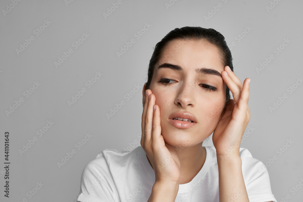 woman with headache discontent health problems close up woman with headache discontent health problems close up