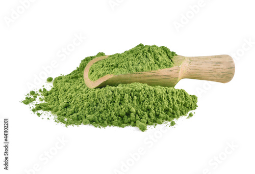 Matcha green tea powder with wooden spoon isolated on white background.