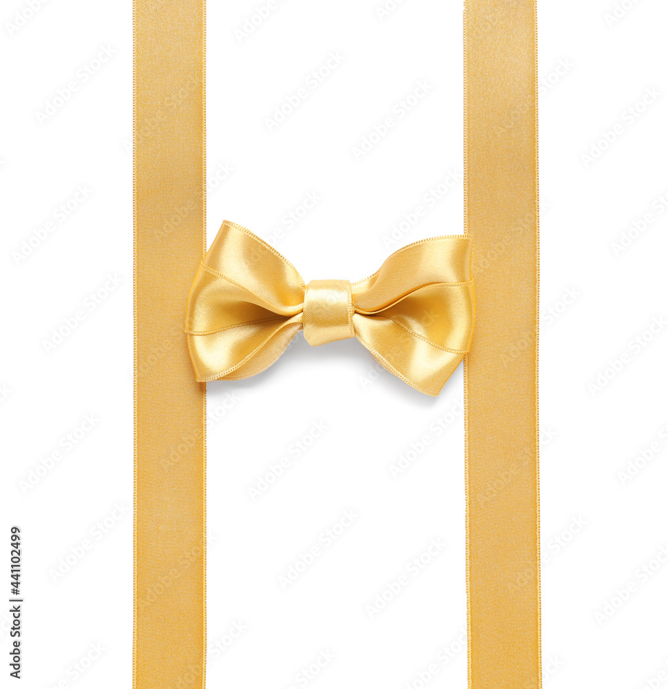 Fototapeta premium Beautiful golden ribbons with bow on white background