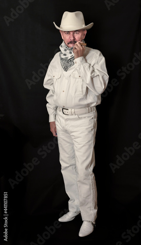  The cowboy with mustache in a white hat, smoking a cigar