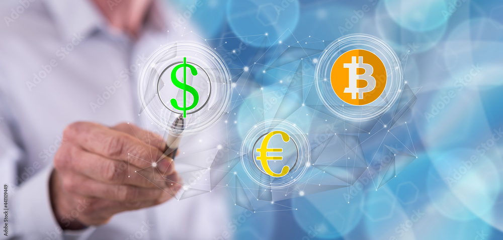 Man touching a currency exchange concept Man touching a currency exchange concept