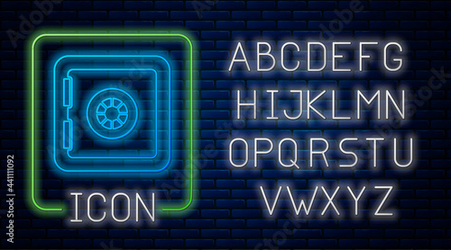 Glowing neon Safe icon isolated on brick wall background. The door safe a bank vault with a combination lock. Reliable Data Protection. Neon light alphabet. Vector