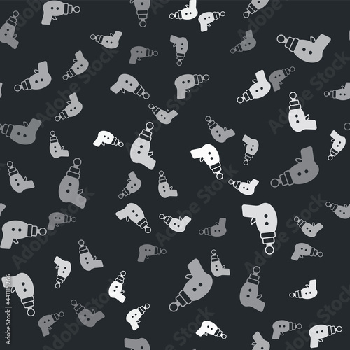 Grey Ray gun icon isolated seamless pattern on black background. Laser weapon. Space blaster. Vector