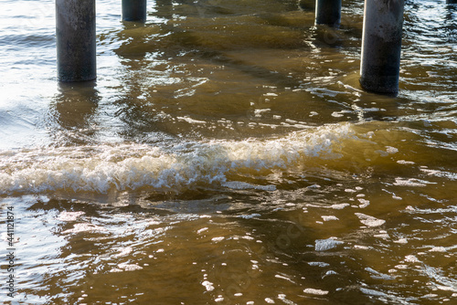 Wallpaper Mural Columnar bridge piers at sunset.View under the bridge into sea with sunset,Background for travel. Torontodigital.ca