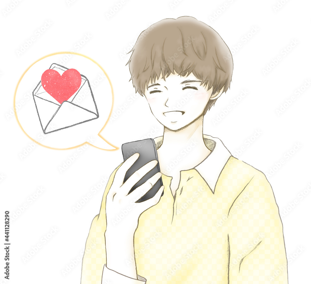 スマホに届いた嬉しいメールに喜ぶ笑顔の若い男性