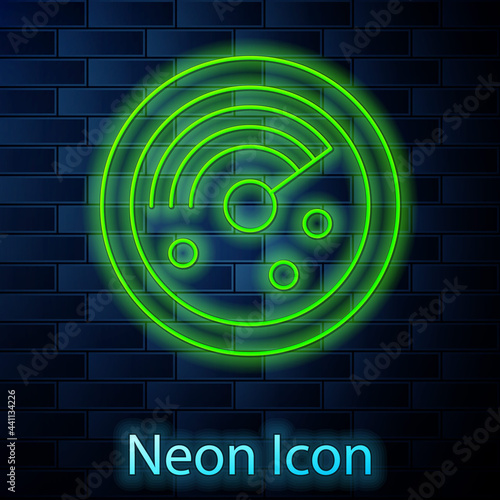 Glowing neon line Radar with targets on monitor in searching icon isolated on brick wall background. Search system. Navy sonar. Vector