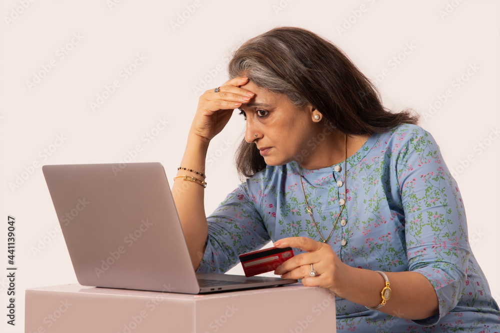 AN OLD WOMAN FEELING DISTRESSED WHILE DOING ONLINE TRANSACTIONS AN OLD WOMAN FEELING DISTRESSED WHILE DOING ONLINE TRANSACTIONS