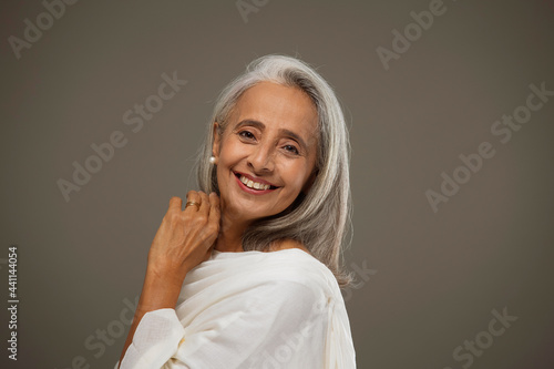 Fotografie Portrait of old beautiful woman smiling.
