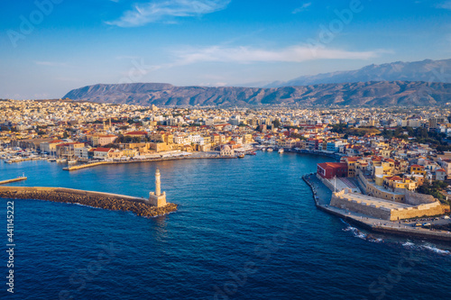 Picturesque old port of Chania. Landmarks of Crete island. Greece. Aerial view of the beautiful city of Chania with it's old harbor and the famous lighthouse, Crete, Greece.