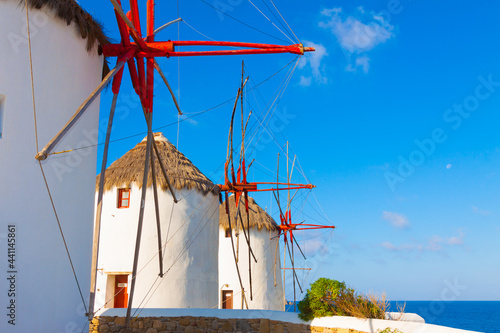 Vivid red color on windmills in Mykonos Island cyclades Greece