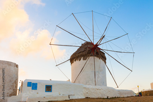 Windmill closeup dawn with partialy blue sky Mykonos island cyclades Greece
