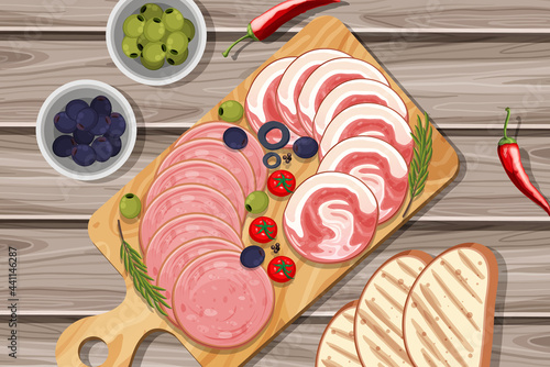 Platter of cold meats and smoked meats on the table background