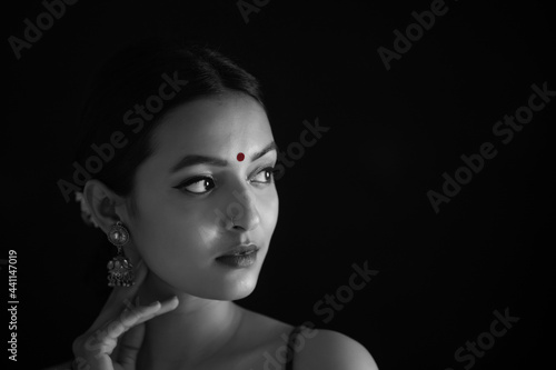 Portrait of a beautiful woman Against Black background