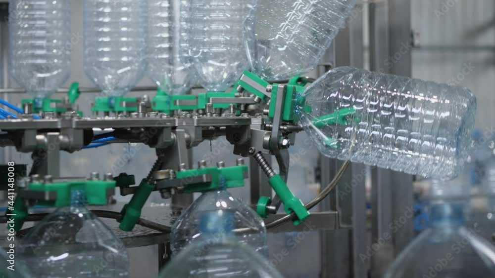 Rinsing Process The process of rinsing plastic bottles before they go on tap ...