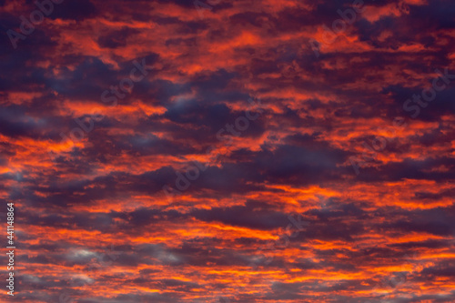 Very intense and colored clouds at sunrise