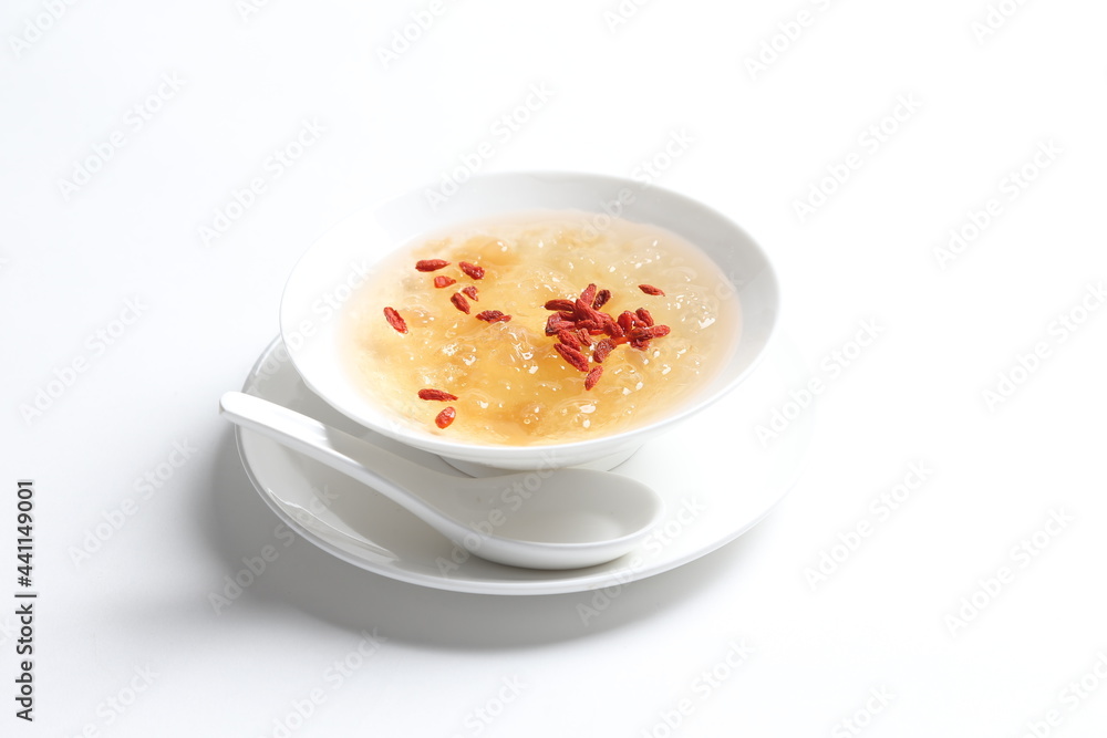 chilled double boiled fresh bird nest with hashima and wolf berries asian sweet soup in white bowl healthy dessert menu chilled double boiled fresh bird nest with hashima and wolf berries asian sweet soup in white bowl healthy dessert menu