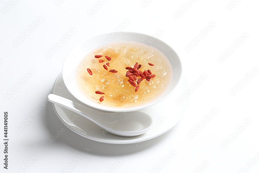 chilled double boiled fresh bird nest with hashima and wolf berries asian sweet soup in white bowl healthy dessert menu chilled double boiled fresh bird nest with hashima and wolf berries asian sweet soup in white bowl healthy dessert menu