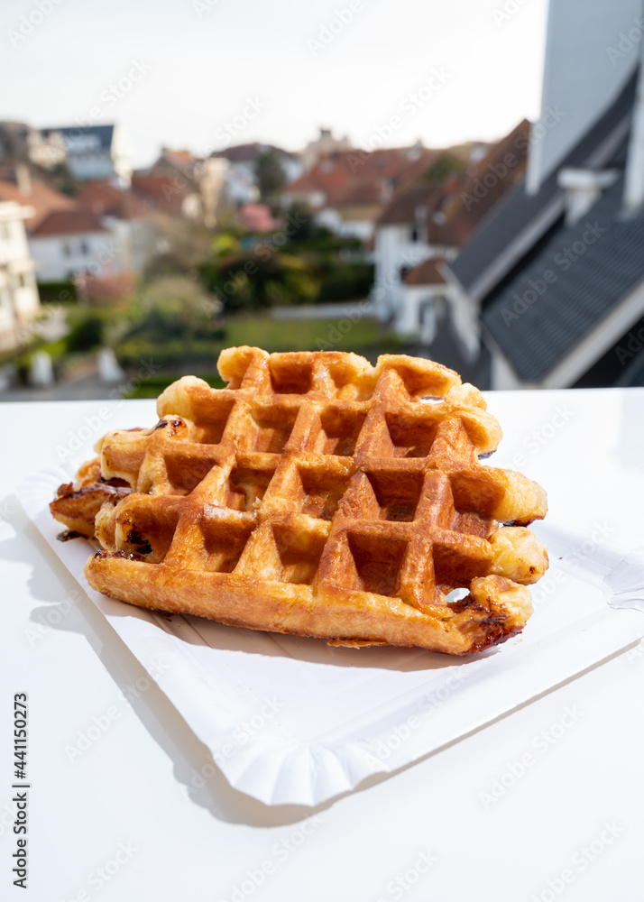 Belgian sugar waffles with black coffee served outdoor Belgian sugar waffles with black coffee served outdoor