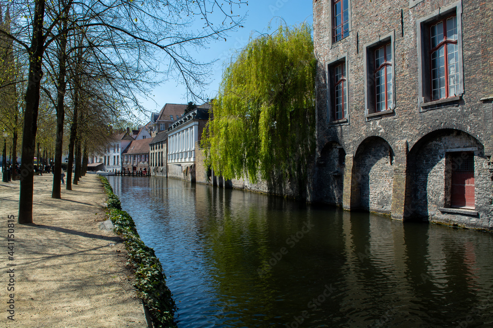 27 April 2021, Bruges, Belgium, walking on medieval Bruges streets in sunny day, travel destination 27 April 2021, Bruges, Belgium, walking on medieval Bruges streets in sunny day, travel destination