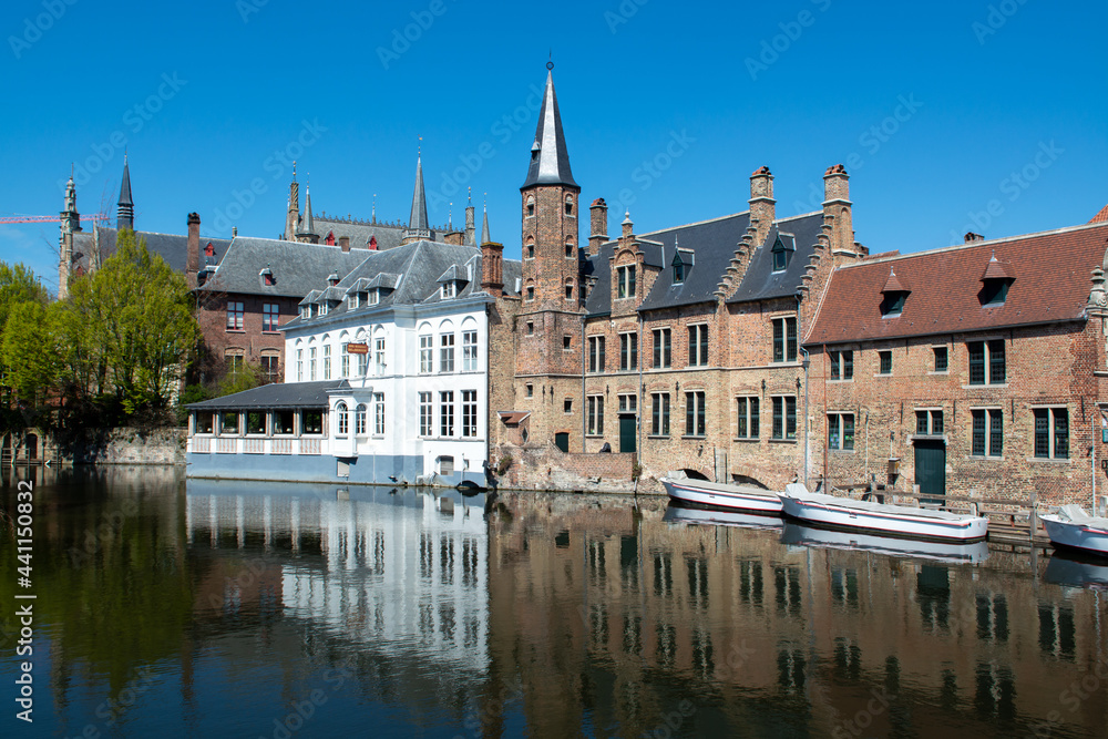 27 April 2021, Bruges, Belgium, walking on medieval Bruges streets in sunny day, travel destination 27 April 2021, Bruges, Belgium, walking on medieval Bruges streets in sunny day, travel destination