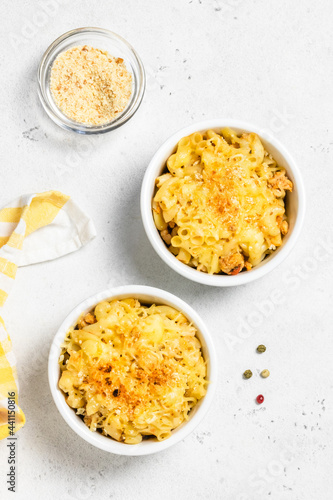 Classic homemade gluten free macaroni and cheese in backing dish.Space for text.