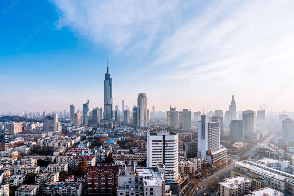 Fototapeta premium Dusk scenery of Zifeng Building and city skyline in Nanjing, Jiangsu, China 