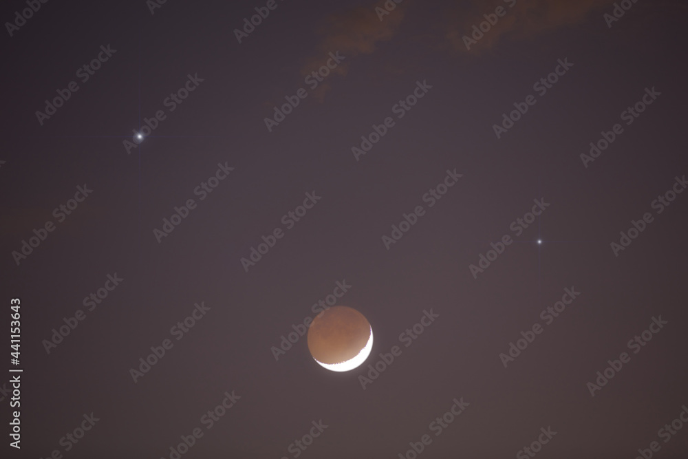 Young crescent Moon and stars on a twilight sky. Young crescent Moon and stars on a twilight sky.