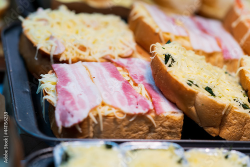 Close up of bacon bread with Cheese, thai street food market