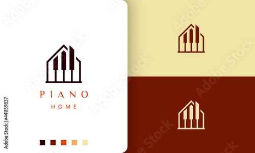 simple and modern piano composer logo or icon in home shape