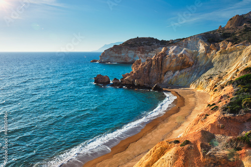 Fototapeta Naklejka Na Ścianę i Meble -  Agios Ioannis beach on sunset. Milos island, Greece