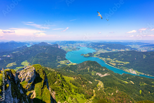 Amazing view from Schafberg by St. Sankt Wolfgang im in Salzkammergut, Haus house Schafbergspitze, lake Mondsee, Moonlake. Blue sky, alps mountains. Upper Austria, Salzburg, near Wolfgangsee, Attersee photo