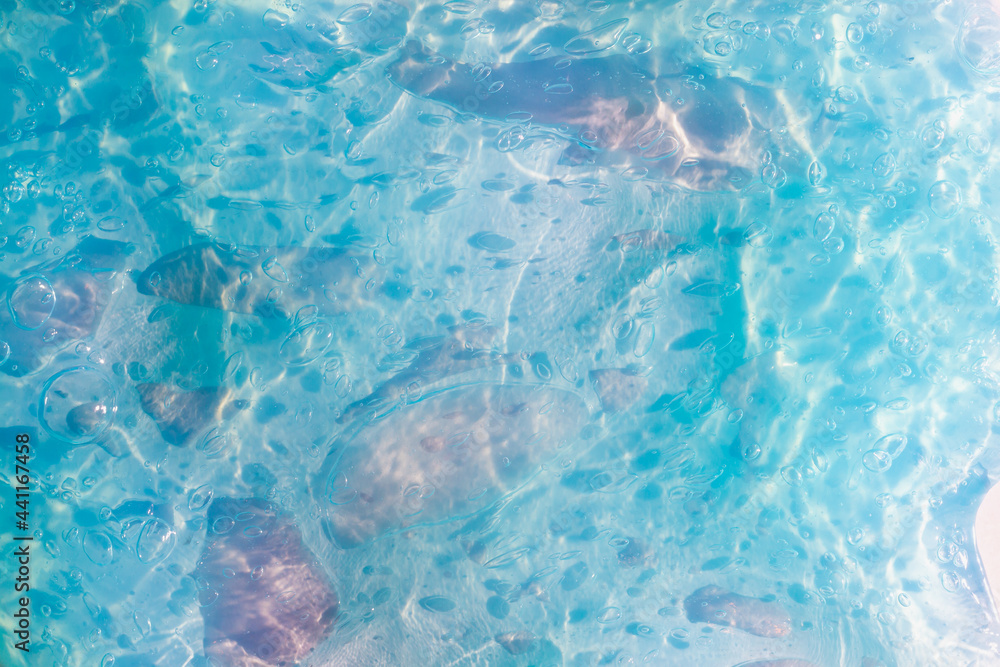 Texture of transparent blue, azure, sky blue slime