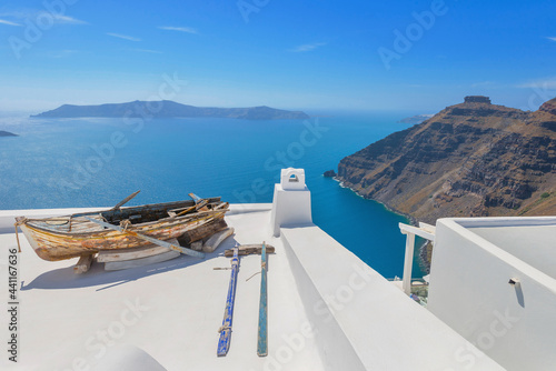 Stunning cupolas with the Caldera (volcano) in the distance in the Greek island of Santorini