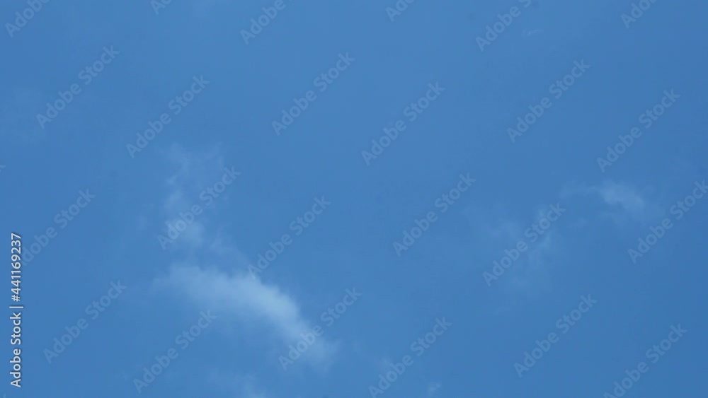 Light Gentle Clouds Fly Away And Dissolve, Revealing A Clear, Clear Blue Sky, 4K Time Lapse Of Nature. Fresh Air, Good Weather Forecast. Background of Blue Sky and Light Clouds. Light Gentle Clouds Fly Away And Dissolve, Revealing A Clear, Clear Blue Sky, 4K Time Lapse Of Nature. Fresh Air, Good Weather Forecast. Background of Blue Sky and Light Clouds.