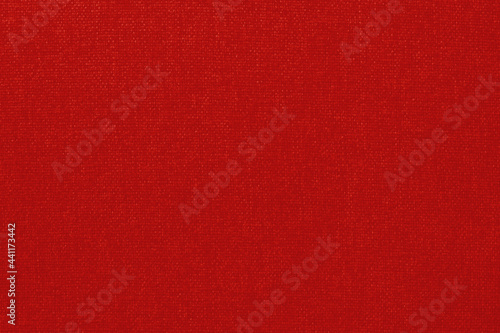 Dark red cotton fabric cloth texture for background, natural textile pattern.