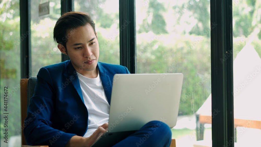 Young muslim business man use laptop in coffee shop Young muslim business man use laptop in coffee shop