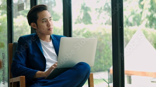 Young muslim business man use laptop in coffee shop