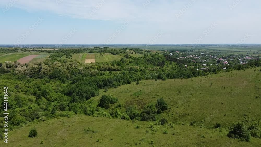 Aerial drone view of a flying over the rural agricultural landscape. Aerial drone view of a flying over the rural agricultural landscape.