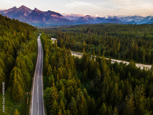 Fototapeta Naklejka Na Ścianę i Meble -  Road in Forest in Tatra Mountains in Podhale, Poland.