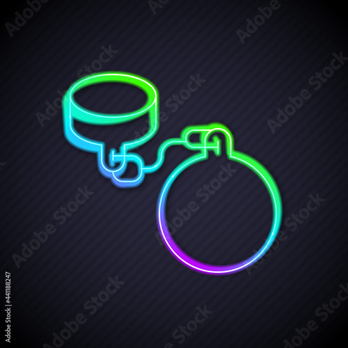 Glowing neon line Ball on chain icon isolated on black background. Vector